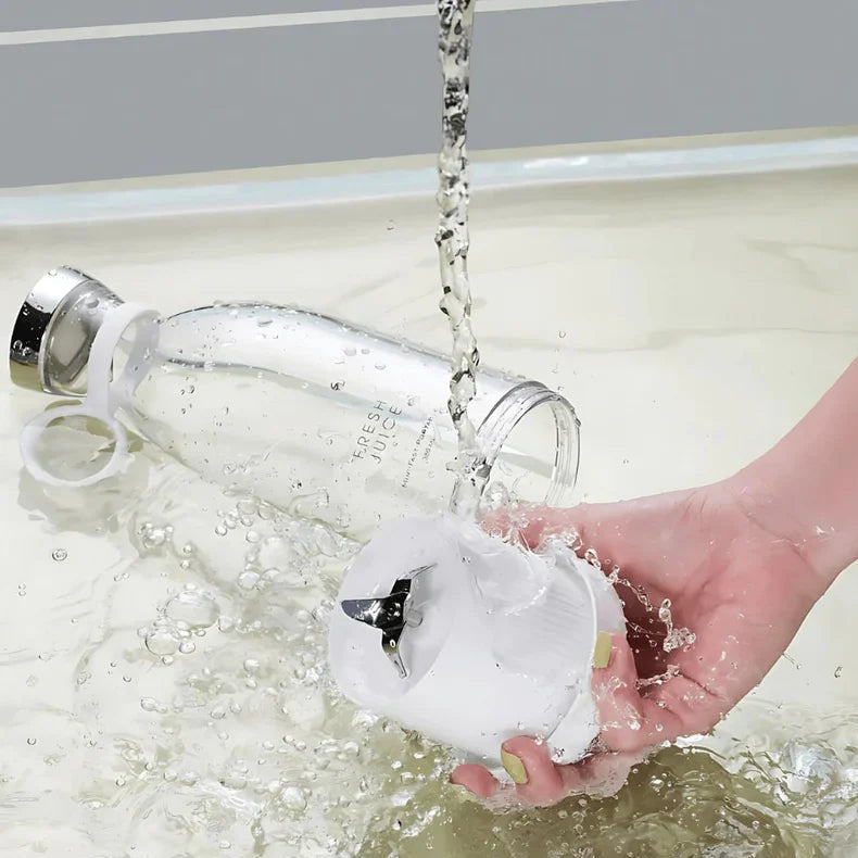 Hand washing a white object under running water with 'Easy To Clean' text displayed.